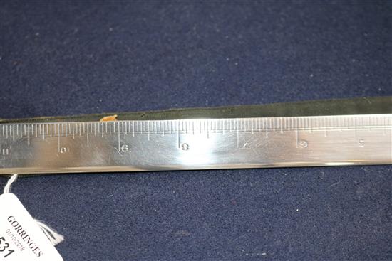 An Asprey & Co. silver ruler, London, 1936.